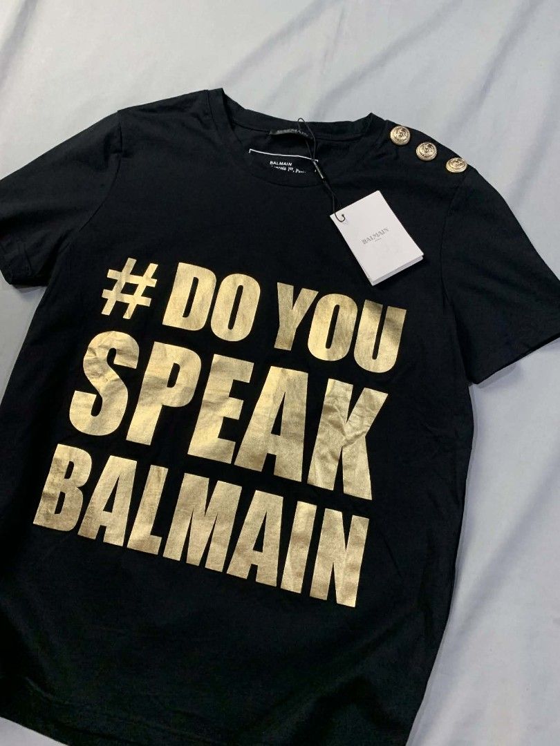 Balmain gold script black shirt (Category: Shirts) located in Manila. Submitted by cold_stuff (Listing ID 1433763877, Image 1). Description: Brand-new with hangtags M on tag 19.5x26 Below srp.