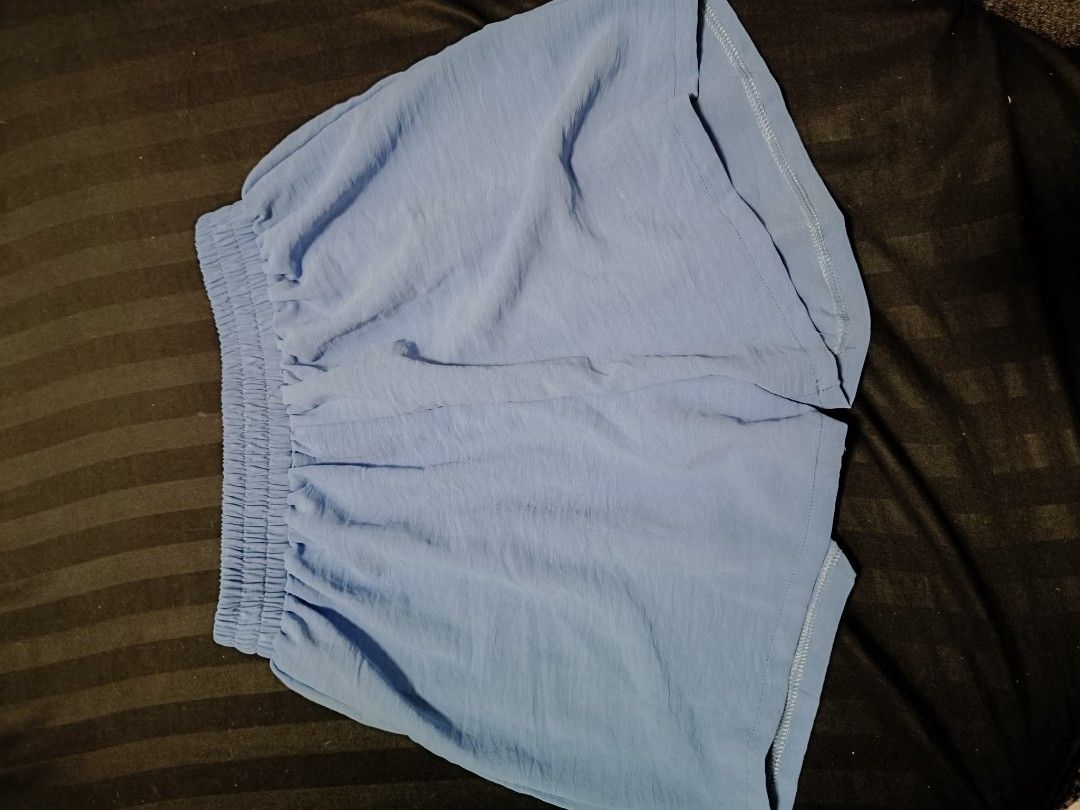 Blue Coordinates Set (Category: Sets or Coordinates) located in Manila. Submitted by cristysuarez (Listing ID 1433599894, Image 2). Description: - Includes a long-sleeved button-down shirt - Matching shorts with elastic waistband - Shirt features a collar and button closures.