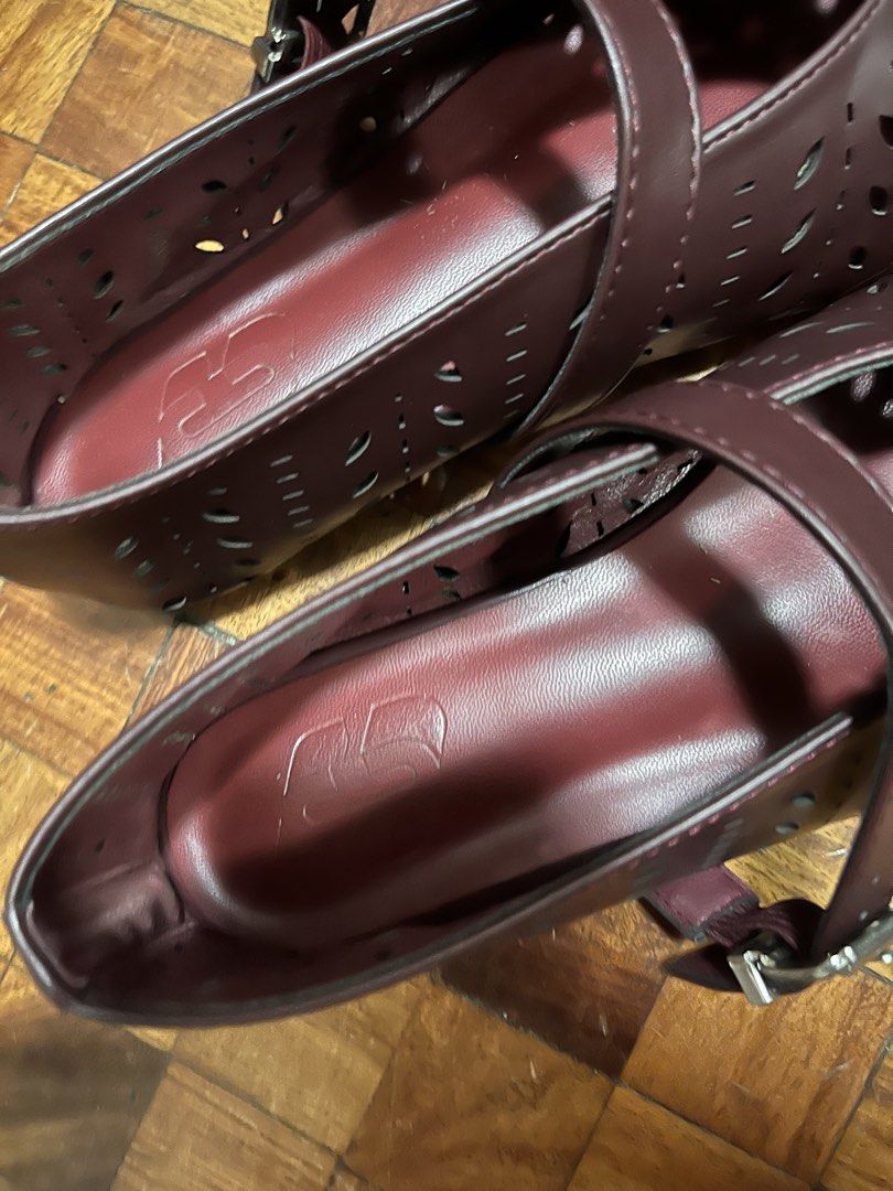 Burgundy Mary Jane Flats Size 39 (Category: Flats & Sandals) located in Pasig City. Submitted by declutter.n.sell (Listing ID 1433593302, Image 3). Description: - Burgundy Mary Jane flats - Size 39 - Laser-cut design - Buckle closure - Square toe - Cushioned insole - Good sole condition - Adds sophistication to any outfit Used i think twice only (indoor setting) Loc is Ortigas Pasig.