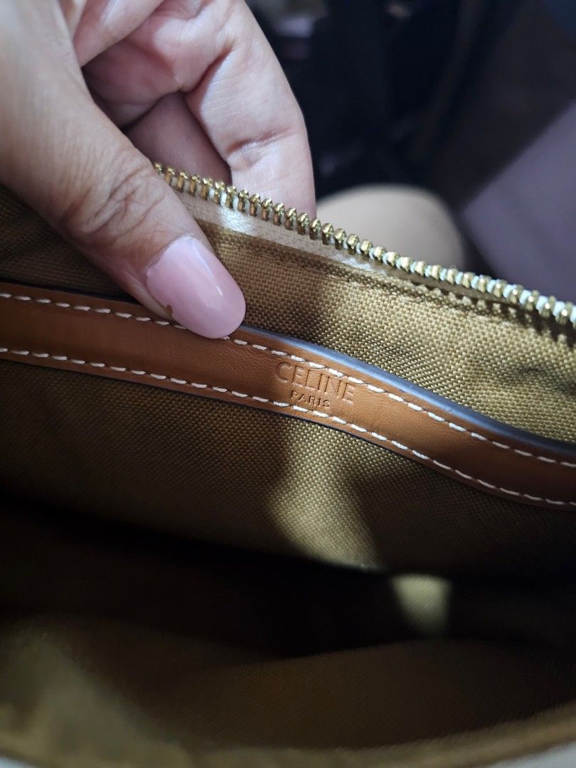 Celine Triomphe Shoulder Bag (Category: Luxury Bags & Wallets) located in Angeles City. Submitted by kodachi10 (Listing ID 1433752995, Image 3). Description: - Celine Triomphe shoulder bag - Signature pattern - Brown leather strap and trim - Fabric lining - Zipper closure - Celine Paris logo - Curved shape - No leather tags inside.