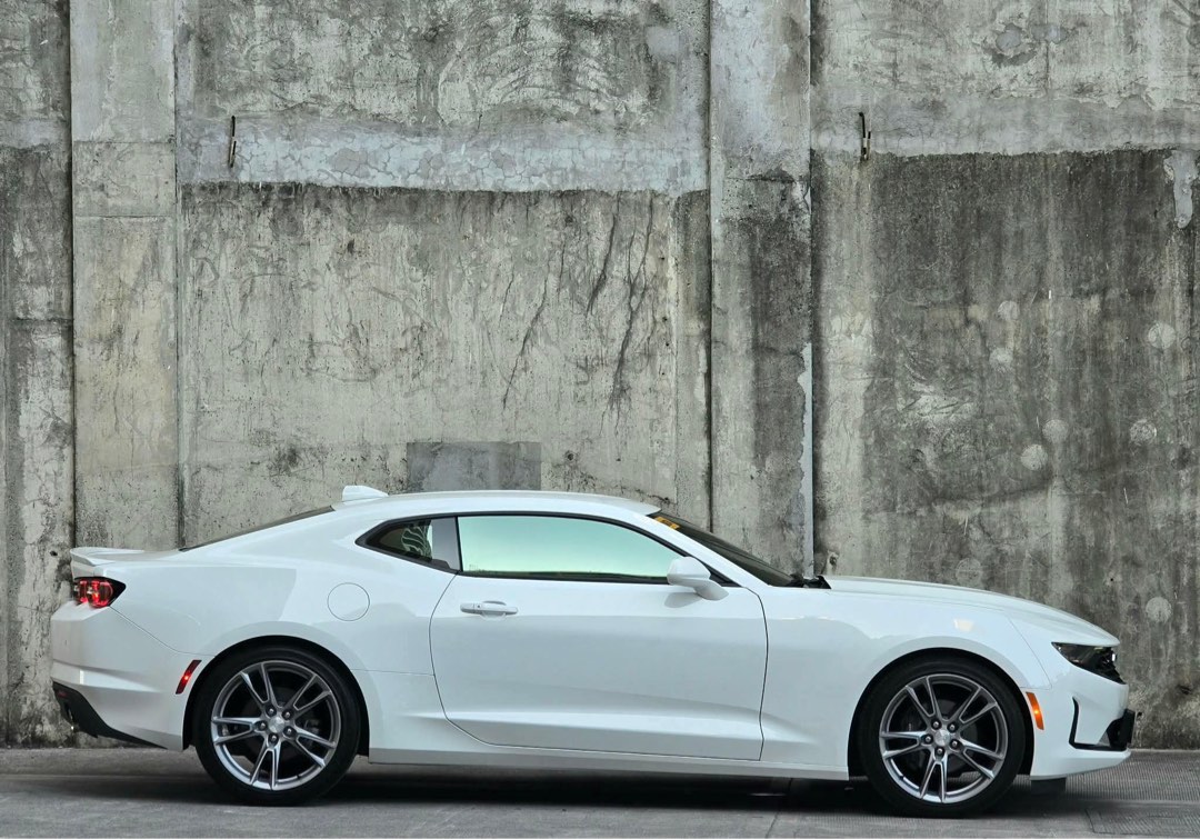Chevrolet Camaro RS 2.0 Turbo Auto (Category: Used Cars) located in Manila. Submitted by quality_cars (Listing ID 1433756052, Image 3). Description: FORSALE/SWAP/FINANCING! Guaranteed best buy ✅️ GOOD AS BRANDNEW!! Almost 1.5M DISCOUNT FROM CASA PRICE. 2023 CAMARO RS!! 3K MILEAGE ONLY!! ORIGINAL or MONEYBACK! NAKA PLASTIC PA! Vehicle: 2023 CAMARO RS 2.0 TURBO Transmission: AT ODO Meter Reading: 3K (orig mileage or moneyback) Color: SUMMIT WHITE E