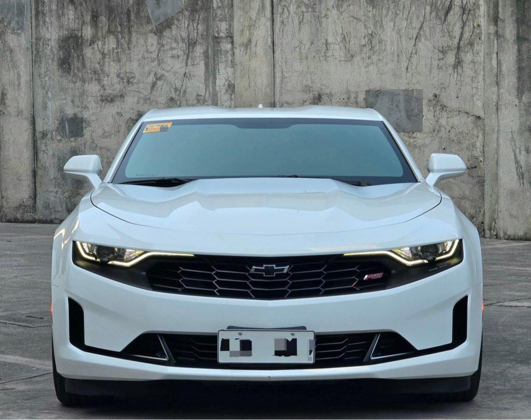 Chevrolet Camaro RS 2.0 Turbo Auto (Category: Used Cars) located in Manila. Submitted by quality_cars (Listing ID 1433756052, Image 1). Description: FORSALE/SWAP/FINANCING! Guaranteed best buy ✅️ GOOD AS BRANDNEW!! Almost 1.5M DISCOUNT FROM CASA PRICE. 2023 CAMARO RS!! 3K MILEAGE ONLY!! ORIGINAL or MONEYBACK! NAKA PLASTIC PA! Vehicle: 2023 CAMARO RS 2.0 TURBO Transmission: AT ODO Meter Reading: 3K (orig mileage or moneyback) Color: SUMMIT WHITE E