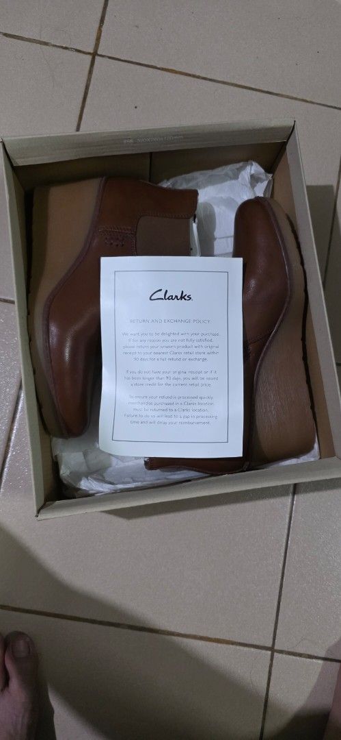 Clarks Hazen Flora Tan Leather Boots (Category: Boots) located in San Pedro. Submitted by karaamara718536 (Listing ID 1433713513, Image 2). Description: - Clarks Hazen Flora boots - Tan leather - Size: 8.5 M, D, 39.5 - Features: Wedge heel, side zipper - Includes: Original box and paper - Sole: Sticker attached only used twice decluttering.