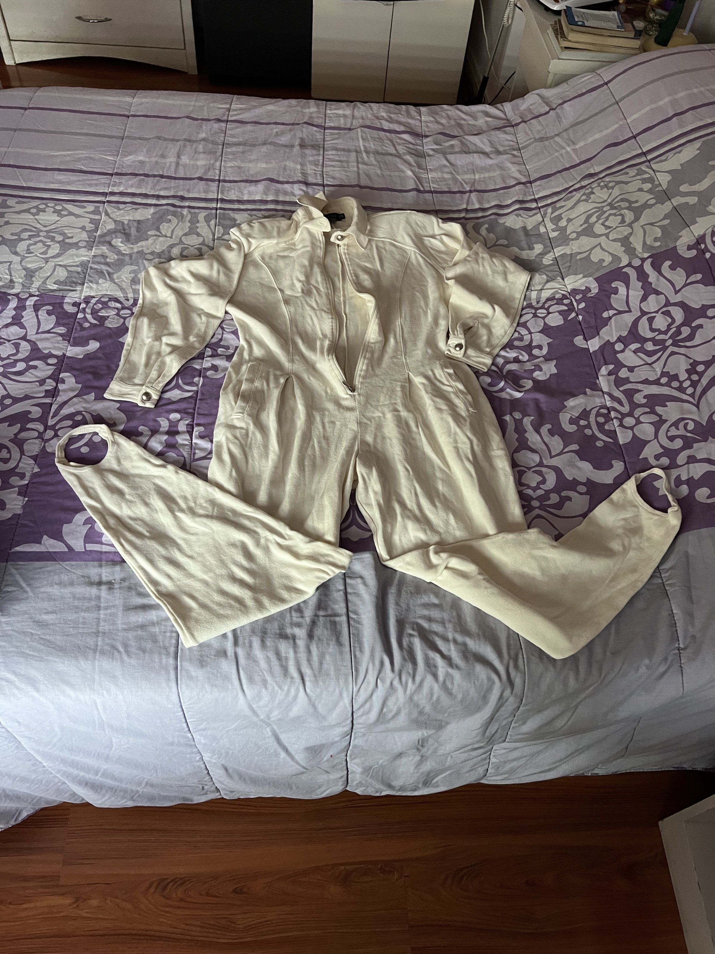 Claude Z Cream Jumpsuit - Size M (Category: Jumpsuits) located in Quezon City. Submitted by jade.young (Listing ID 1433660424, Image 1). Description: - Claude Z cream jumpsuit, size M - Collared neckline - Full-length zipper - Stirrup-style legs - Cotton and spandex blend - Long sleeves with buttoned cuffs - Ribbed knit fabric adult onesies pit to pit 19.