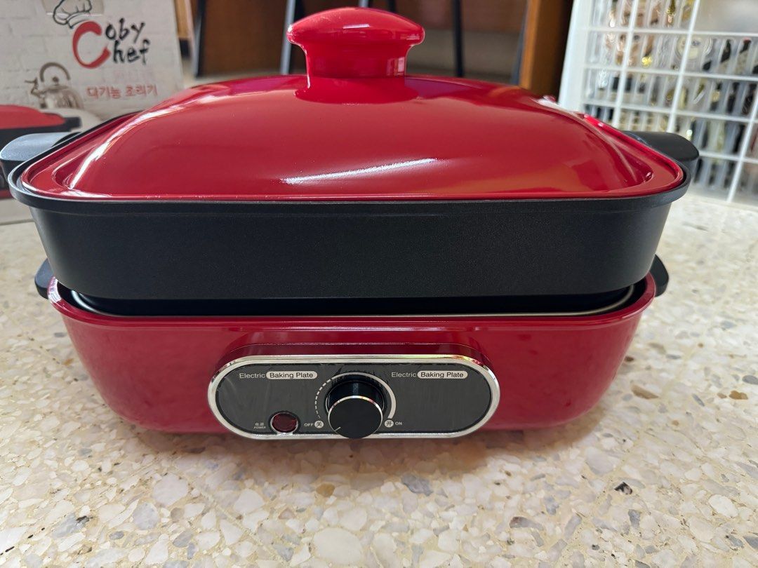 Coby Chef Multi-Function Electric Pot (Category: Cookers) located in Kuala Lumpur. Submitted by wintermelon_stuffs (Listing ID 1433639684, Image 2). Description: Coby Chef electric pot is a multi-function cooker for steaming, grilling, and braising. It features a knob adjustment for high, medium, and low temperature control. The pot includes a steaming pan, 2.5L hot pot, a striped grill plate, a cover, and a plug wire. It has a bottom cooling sys