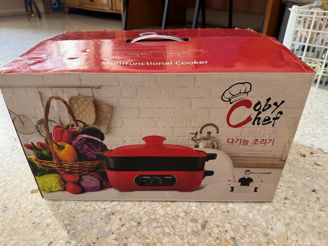 Coby Chef Multi-Function Electric Pot (Category: Cookers) located in Kuala Lumpur. Submitted by wintermelon_stuffs (Listing ID 1433639684, Image 1). Description: Coby Chef electric pot is a multi-function cooker for steaming, grilling, and braising. It features a knob adjustment for high, medium, and low temperature control. The pot includes a steaming pan, 2.5L hot pot, a striped grill plate, a cover, and a plug wire. It has a bottom cooling sys