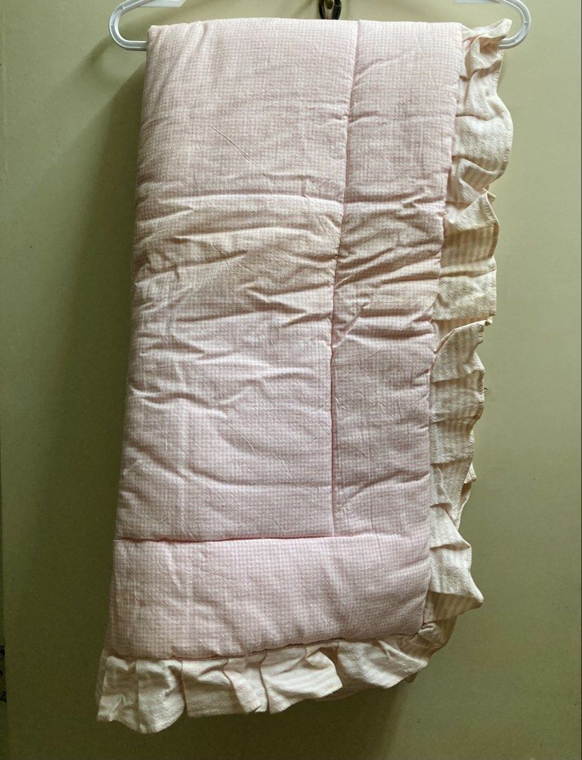 Baby Comforter (Category: Children's Beds) located in Manila. Submitted by daddythrifter (Listing ID 1433595557, Image 3). Description: Never been used Bought in Rustan’s Size: 47.5 inch x 24 inch Material: Cotton Color: Pink Issue: with 3 stains but can be wash as shown on the last 3 pics due to storage.