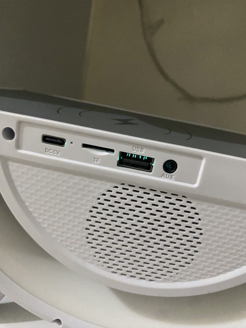 Digital Bluetooth Clock (Category: Clocks) located in Makati City. Submitted by makatigirlpreloved (Listing ID 1433692024, Image 3). Description: - Sunrise alarm clock with wireless charging - Digital display for time - Multiple light settings - Bluetooth connectivity - USB port and AUX input - Unique curved light design.