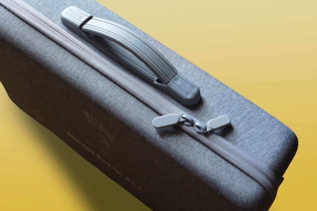 DJI RS 4 Storage Bag/Case (Category: Camera Bags & Carriers) located in Bombon. Submitted by gvrgs (Listing ID 1433612874, Image 3). Description: DJI RS 4 Storage Bag/Case - Specifically designed for the DJI RS 4 gimbal. - Durable exterior for protection. - Custom-fit interior compartments for organization. - Soft interior lining to prevent scratches. ISSUE: Missing Strap Sold on online shops for Php 2,100.00 RFS: Not being used..