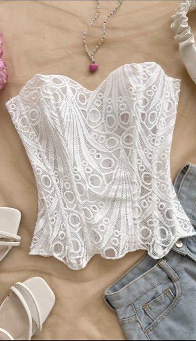 Eyelet Corset tube top (Category: Sleeveless) located in Davao. Submitted by myrandomstufff (Listing ID 1433701269, Image 1). Description: Had to put lining inside since its see through, can send photos upon request item is brandnew never used rfs change of plans for halloween costume last price posted.