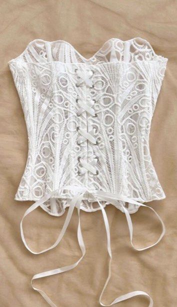 Eyelet Corset tube top (Category: Sleeveless) located in Davao. Submitted by myrandomstufff (Listing ID 1433701269, Image 2). Description: Had to put lining inside since its see through, can send photos upon request item is brandnew never used rfs change of plans for halloween costume last price posted.