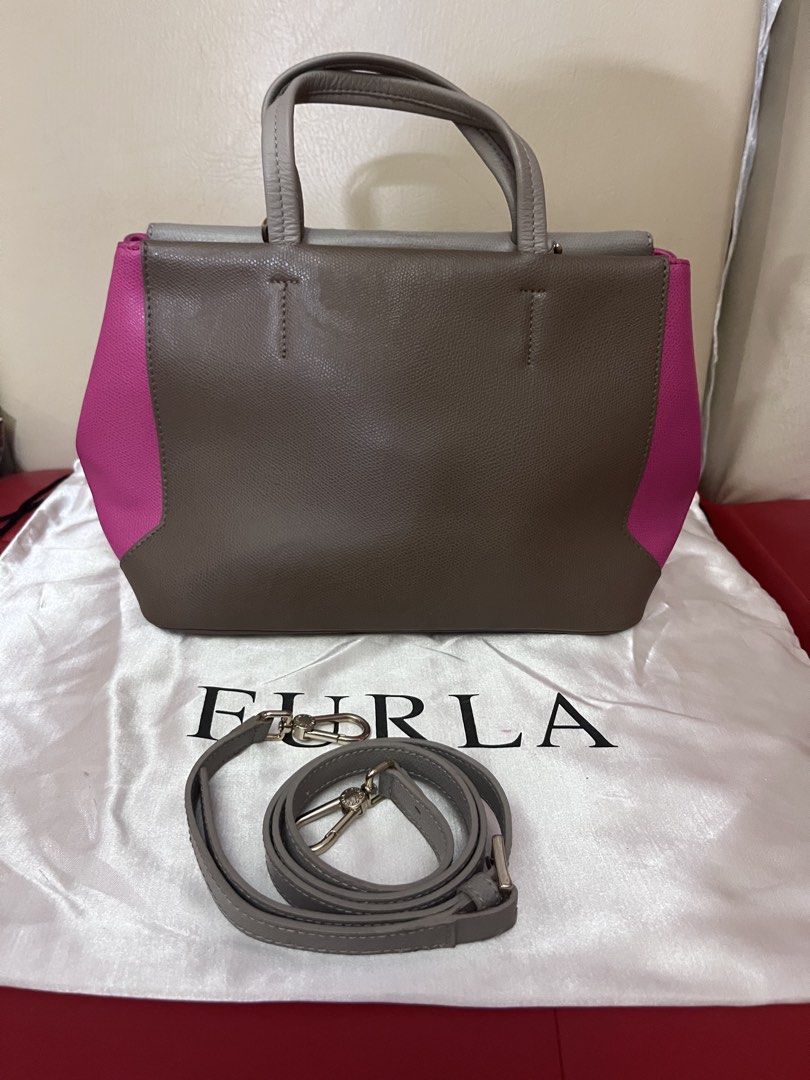 Furla Colorblock Satchel Bag (Category: Luxury Bags & Wallets) located in Victorias. Submitted by lan1877 (Listing ID 1433696705, Image 2). Description: - Authentic Furla Satchel Bag - Colorblock design: Gray, Pink, Brown - Features: - Top handle - Detachable shoulder strap - Metal clasp closure W dust bag No issue - Includes dust bag - Interior: Furla label with "Genuine Leather" print - Made in Romania 3k plus sf.