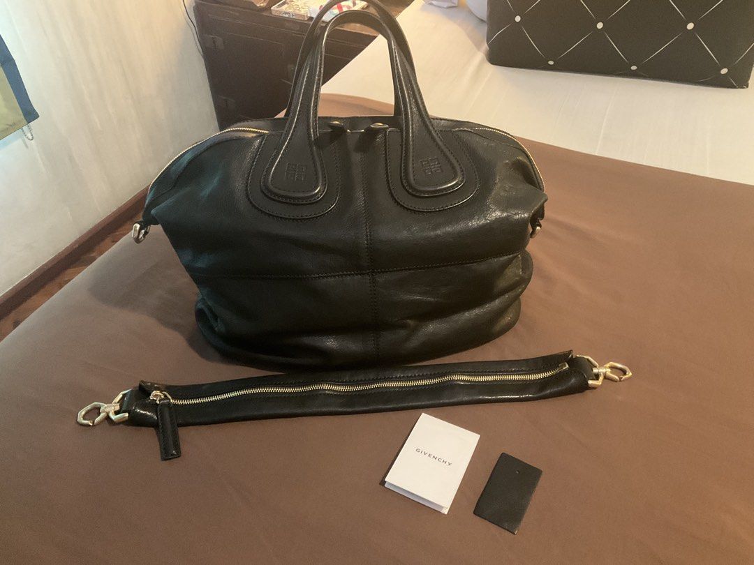 Givenchy Nightingale Leather Handbag Medium BLACK LAMBSKIN (Category: Luxury Bags & Wallets) located in Makati City. Submitted by ars1971 (Listing ID 1433588300, Image 1). Description: 100% Authentic! I do not buy or use FAKE ITEMS! AVAILABLE IF POSTED! DO NOT Ask! Read before inquiring! NO ASKING LAST PRICE PLEASE! EXCELLENT CONDITION (still with new leather smell). HARDLY USED. NO ISSUES GOLD HARDWARE. Celebrity Fav Cult Classic Bag! ENTRUPY VE