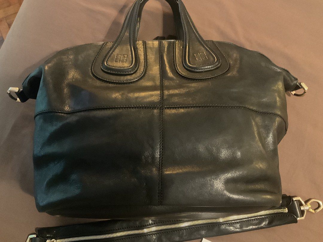 Givenchy Nightingale Leather Handbag Medium BLACK LAMBSKIN (Category: Luxury Bags & Wallets) located in Makati City. Submitted by ars1971 (Listing ID 1433588300, Image 3). Description: 100% Authentic! I do not buy or use FAKE ITEMS! AVAILABLE IF POSTED! DO NOT Ask! Read before inquiring! NO ASKING LAST PRICE PLEASE! EXCELLENT CONDITION (still with new leather smell). HARDLY USED. NO ISSUES GOLD HARDWARE. Celebrity Fav Cult Classic Bag! ENTRUPY VE