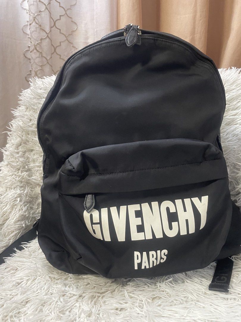 Givenchy Paris Black Backpack (Category: Backpacks) located in Quezon City. Submitted by impulse.ph (Listing ID 1433721059, Image 1). Description: - Authentic Givenchy backpack - White Givenchy Paris logo - Top handle - Adjustable shoulder straps - Multiple compartments - Zipper closure - Small front pocket - Made in Italy.