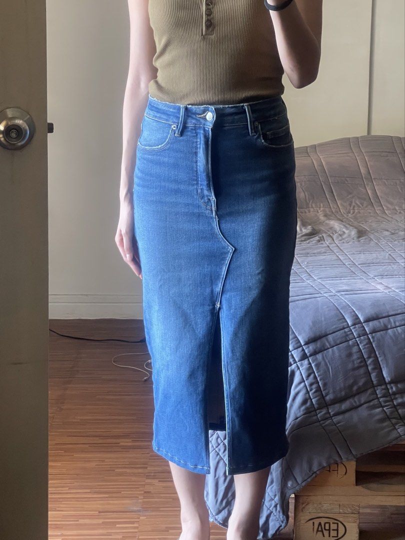 Good American Denim Midi Skirt (Category: Skirts) located in Quezon City. Submitted by sometimes_sj (Listing ID 1433593711, Image 2). Description: - Good American denim midi skirt - Size: 4/27 - Color: Medium wash blue - Features a front slit - Button and zipper closure - Comfortable fit and stretch - No flaws - RFS: don’t wear anymore.