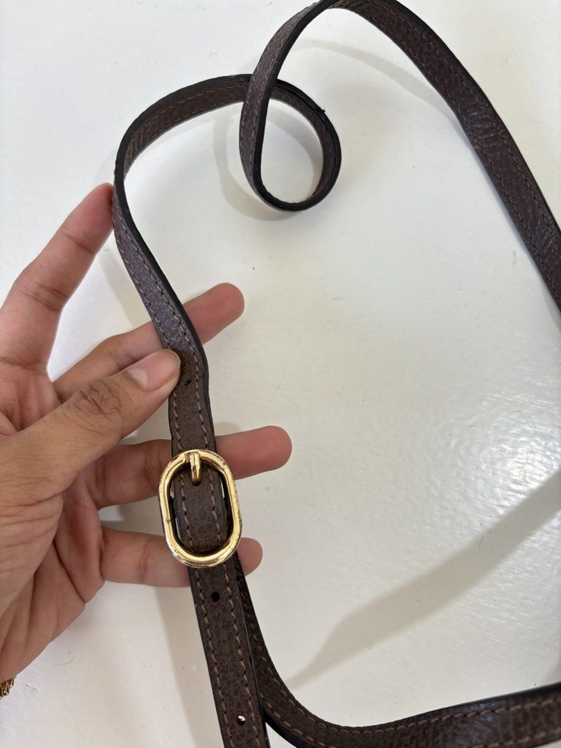 Gucci GG Supreme Bucket Bag (Category: Luxury Bags & Wallets) located in Dagupan City. Submitted by raregrail.co (Listing ID 1433637451, Image 3). Description: - Authentic Gucci bucket bag - Iconic GG Supreme canvas - Drawstring closure - Brown leather strap - Red and green stripe detail - Light-colored fabric lining - Gold-tone buckle - Interior leather tag with Gucci logo and "Made in Italy".