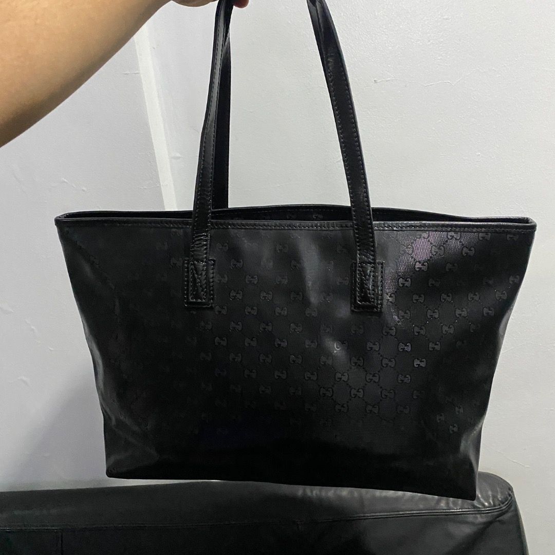 Gucci Imprime GG Tote Bag (Category: Luxury Bags & Wallets) located in Antipolo. Submitted by bentakahitanoano (Listing ID 1433677373, Image 3). Description: Gucci Imprime GG Tote Bag Still in great shape. Features the signature GG Imprimé coated canvas, known for its sleek, glossy finish and durability. A sophisticated and practical luxury accessory. Condition. Great used condition, though please note the inside zipper has an issue (likely an ea