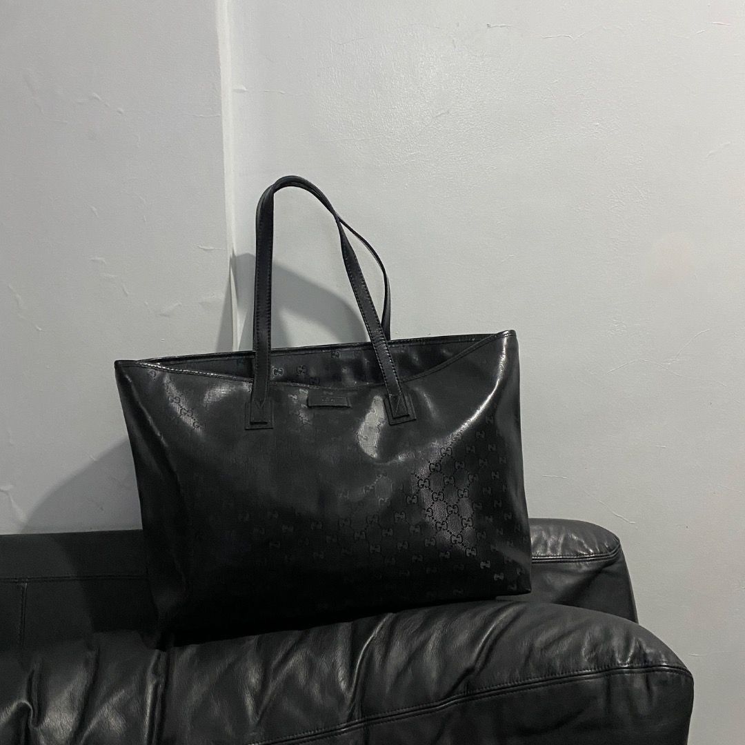 Gucci Imprime GG Tote Bag (Category: Luxury Bags & Wallets) located in Antipolo. Submitted by bentakahitanoano (Listing ID 1433677373, Image 1). Description: Gucci Imprime GG Tote Bag Still in great shape. Features the signature GG Imprimé coated canvas, known for its sleek, glossy finish and durability. A sophisticated and practical luxury accessory. Condition. Great used condition, though please note the inside zipper has an issue (likely an ea