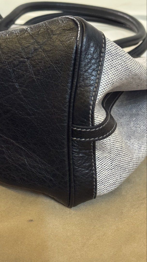 Hermes Garden Party Tote 36 (Category: Luxury Bags & Wallets) located in Marikina City. Submitted by fmcbt (Listing ID 1433751717, Image 3). Description: Authentic Hermes Garden Party tote bag - Grey canvas body with black leather trim and handles. - Snap closure. - Spacious interior. - Includes dust bag. - Sturdy handles with signs of use. - Black leather reinforced corners and base. RFS: Decluttering Can do meet ups: Manila, Makati, or Pasay.