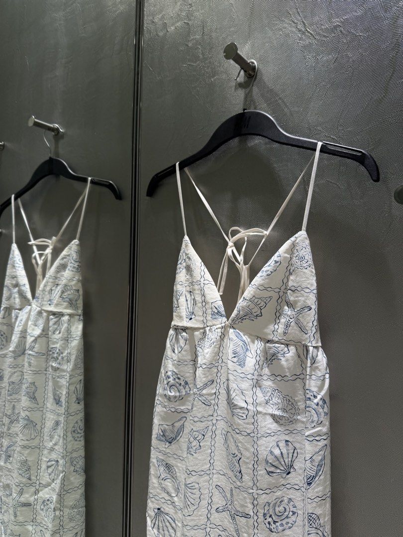 H&M White Seashell Print Maxi Dress (Category: Dresses) located in Manila. Submitted by hearty.y (Listing ID 1433582533, Image 1). Description: - White maxi dress - Blue seashell print - V-neckline - Spaghetti straps (cross-back) - Flowy, lightweight fabric - Full-length - Ideal for warm weather - Got it around 2,999.