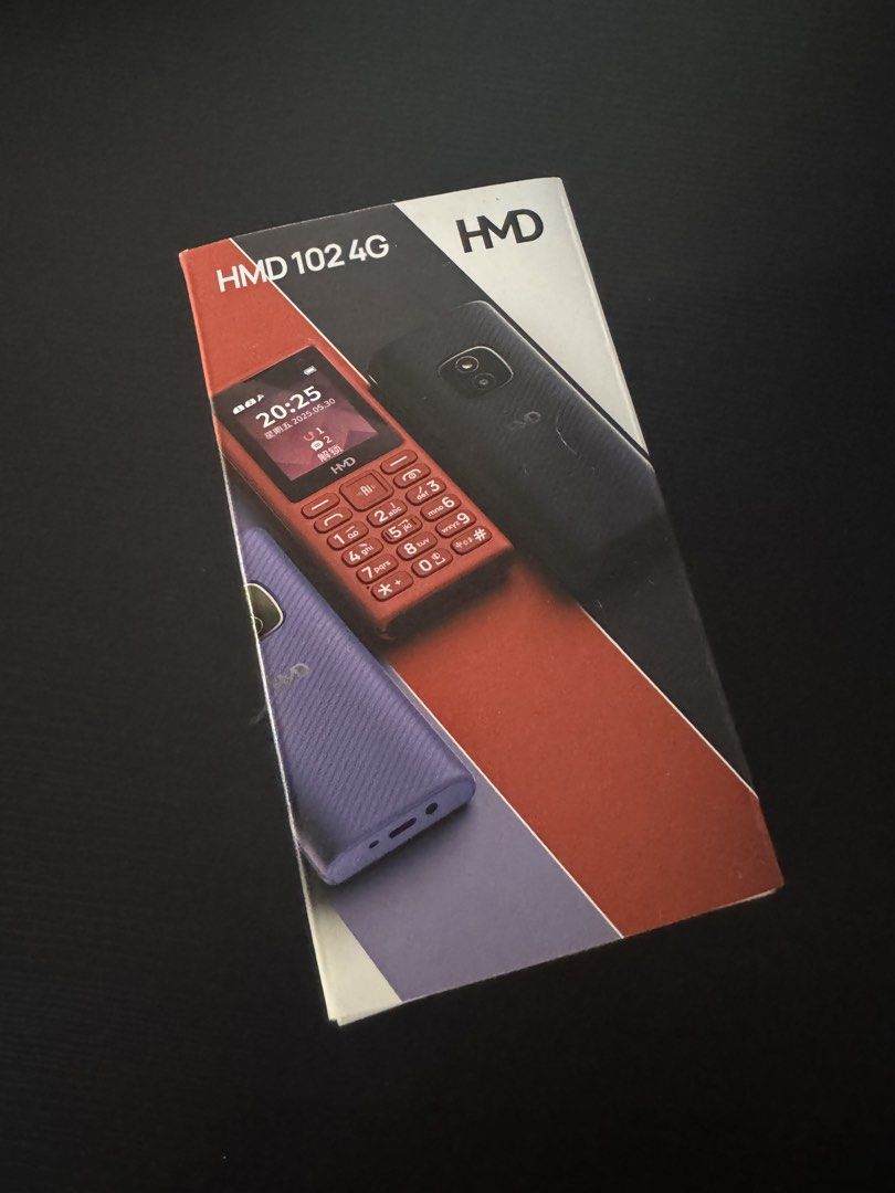 HMD 102 4G Mobile Phone (NOKIA) (Category: Early Generation Mobile Phones) located in Trece Martires City. Submitted by lakingking (Listing ID 1433668682, Image 1). Description: - HMD 102 4G Mobile Phone - 4G LTE connectivity - USB Type-C charging - 2-inch screen - 3.5mm headphone jack - Supports up to 32GB storage - FM radio - 1000mAh battery - Color: Purple (as indicated on the box).