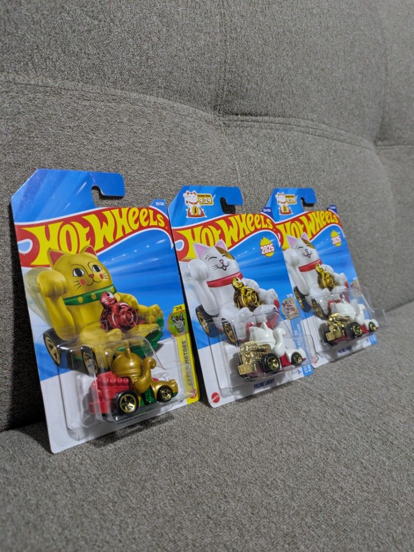 Hot Wheels Celebration Racer 2025 (Category: Vehicle & Diecast Models) located in Manila. Submitted by neo921 (Listing ID 1433736832, Image 2). Description: Sold each. 450 if take all. Buyer pays delivery fee. - Hot Wheels Celebration Racer diecast cars - Features a lucky cat design - Includes multiple cars - All cars are in original packaging - From the 2025 series - Perfect for collectors - Each car has a unique design and color.
