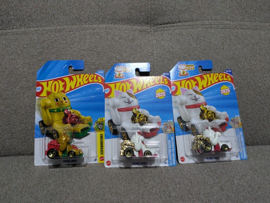 Hot Wheels Celebration Racer 2025 (Category: Vehicle & Diecast Models) located in Manila. Submitted by neo921 (Listing ID 1433736832, Image 1). Description: Sold each. 450 if take all. Buyer pays delivery fee. - Hot Wheels Celebration Racer diecast cars - Features a lucky cat design - Includes multiple cars - All cars are in original packaging - From the 2025 series - Perfect for collectors - Each car has a unique design and color.
