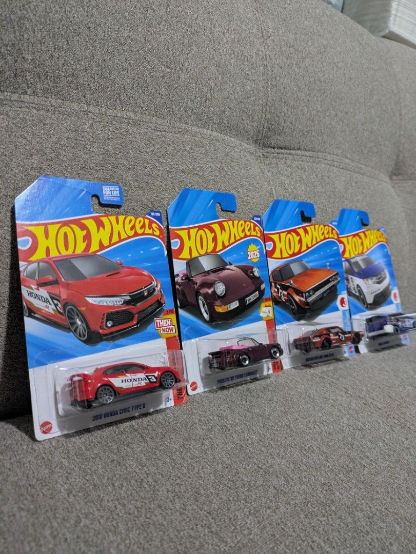 Hot Wheels Diecast Cars (Category: Vehicle & Diecast Models) located in Manila. Submitted by neo921 (Listing ID 1433736507, Image 2). Description: Sold each. 620 if take all. Buyer pays delivery fee. - Hot Wheels diecast car set - Includes: - Red Honda Civic Type R - Maroon Porsche 911 - Orange Nissan Skyline - Blue Honda odessey - All cars are in original packaging - Perfect for collectors and gifts.