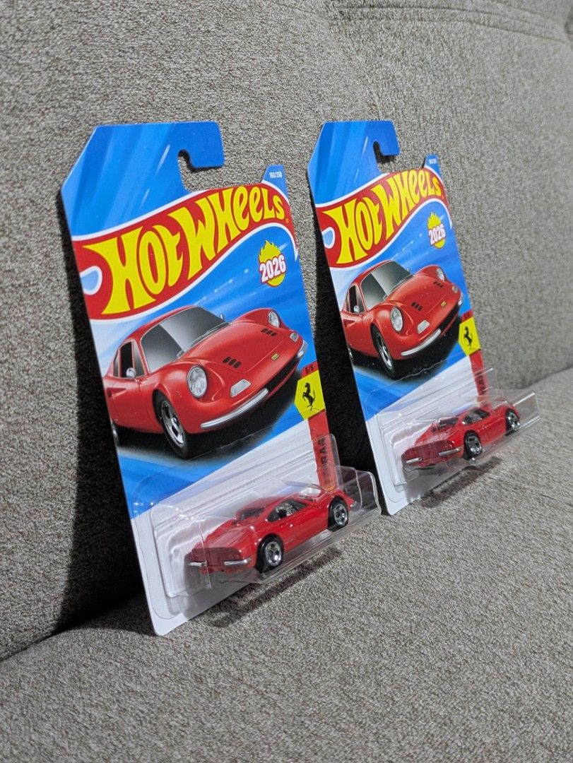 Hot Wheels Ferrari Dino 206 GT (Category: Vehicle & Diecast Models) located in Manila. Submitted by neo921 (Listing ID 1433734787, Image 2). Description: Sold each. 450 if take all. Buyer pays delivery fee. - Hot Wheels Ferrari Dino 206 GT diecast car - Color: Red - Comes in original packaging - Packaging year: 2026 - Part of the Hot Wheels collection - Features the Ferrari logo.