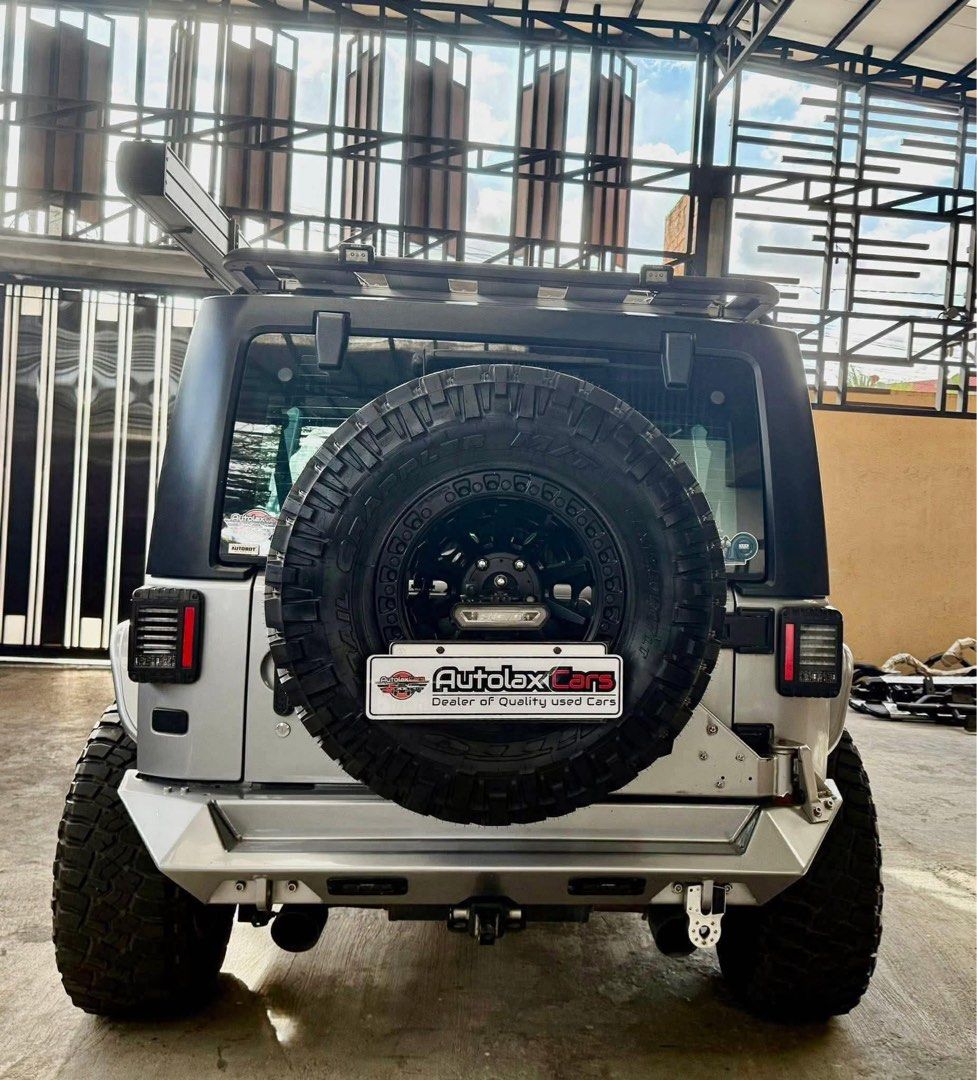 Jeep Wrangler JK Auto (Category: Used Cars) located in Manila. Submitted by quality_cars (Listing ID 1433687500, Image 3). Description: 2018 Jeep Wrangler JK, original 30k+ mileage only, properly built and very fresh interior and exterior, PIAA Roof and Cowl Lights, STEDI Headlights, J.W. Speakers Tail Ligts, Rigid LED Side Mirrors, Multiple Rigid AUX Lights, “Sealed Gen 2” Come-Up Winch, AEV Roof Rack, AEV Hood, ARB Awning Tent w/ Aluminum Case,