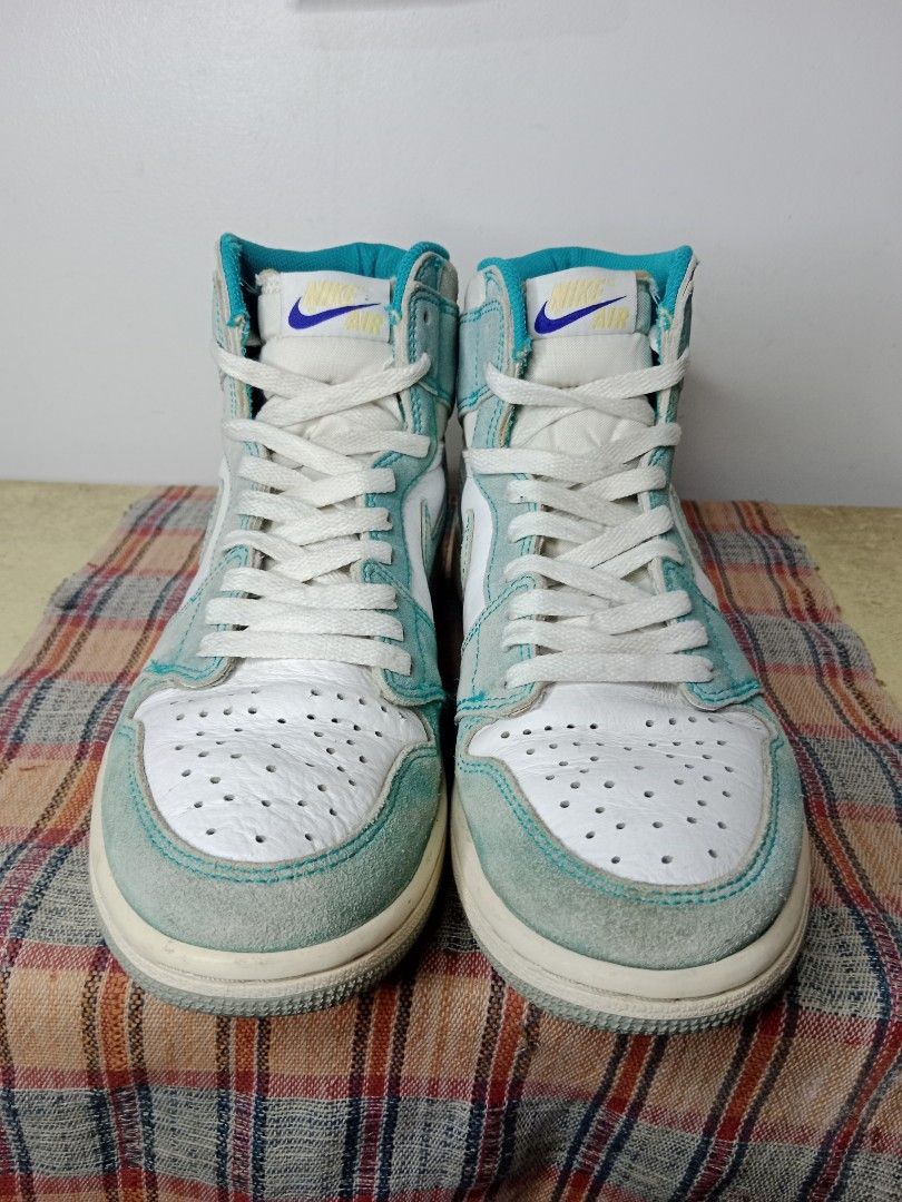 Jordan 1 Turbo Green Size 8 (Category: Sneakers) located in Caloocan City. Submitted by michaelmp2026 (Listing ID 1433678653, Image 3). Description: - Air Jordan 1 Turbo Green sneakers - Size 8 - White leather base - Teal suede overlays - Nike swoosh visible - Teal tongue and collar.