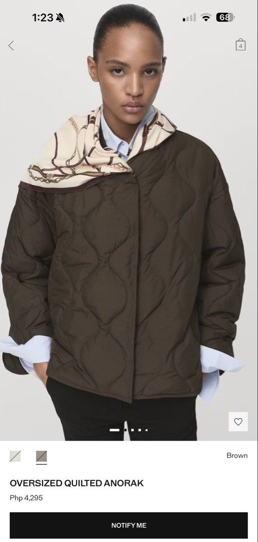 Mango Oversized Quilted Anorak Jacket (Category: Coats, Jackets and Outerwear) located in Marikina City. Submitted by prelovedbybaci (Listing ID 1433631030, Image 3). Description: Mango Quilted Jacket - Size: S - Color: Brown - Original Price: ₱4,295 - Never used; with price tag RFS: My trip got cancelled! Nowhere to use it. .