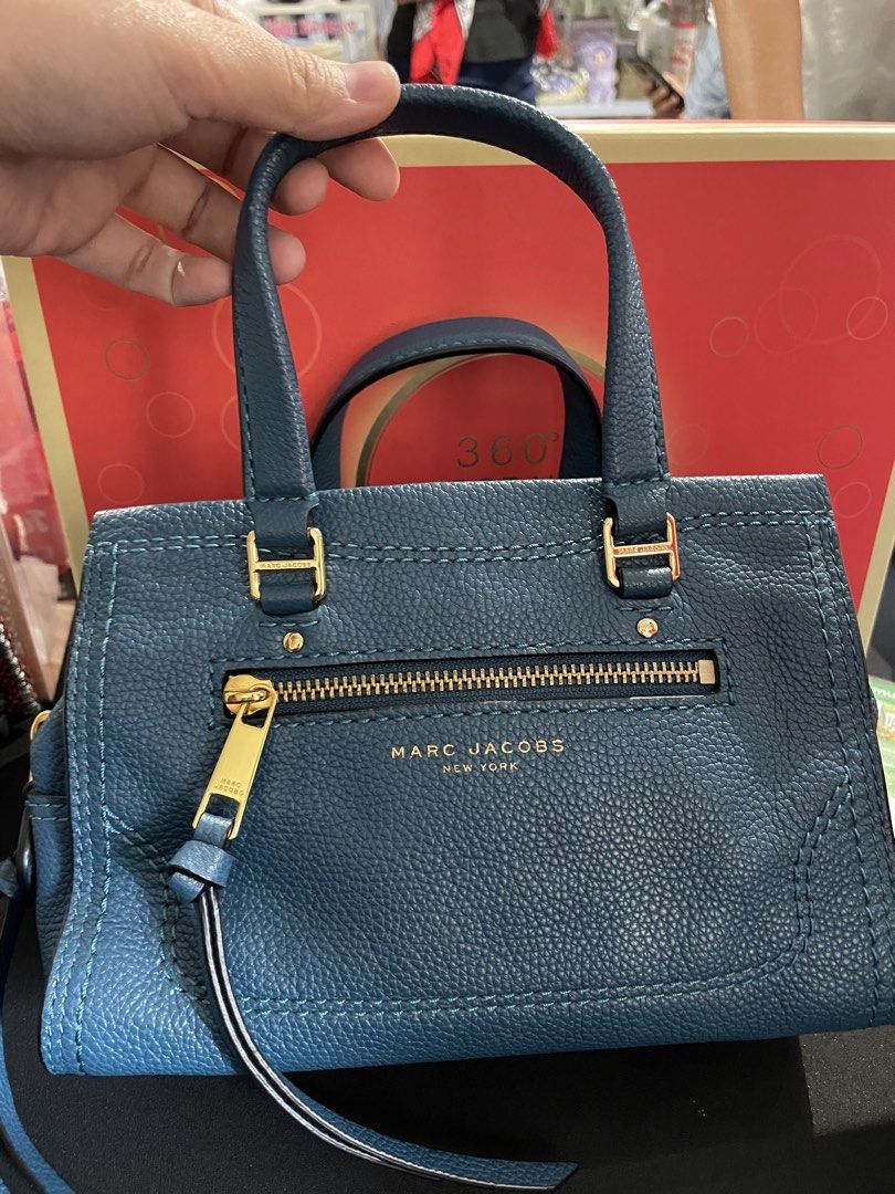 Marc Jacobs Mini Cruiser Bag (Category: Luxury Bags & Wallets) located in Quezon City. Submitted by sashiimii1720 (Listing ID 1433750136, Image 1). Description: - Original Marc Jacobs Mini Cruiser Pebbled Leather Crossbody Bag in Deep Teal - Top handle with detachable, adjustable shoulder strap - Zip closure - Size: 6” H x 8.5” W x 4” D - US Bought 🇺🇸 - With care card NOTE: With minor flaw on the handle (pls see last photo).