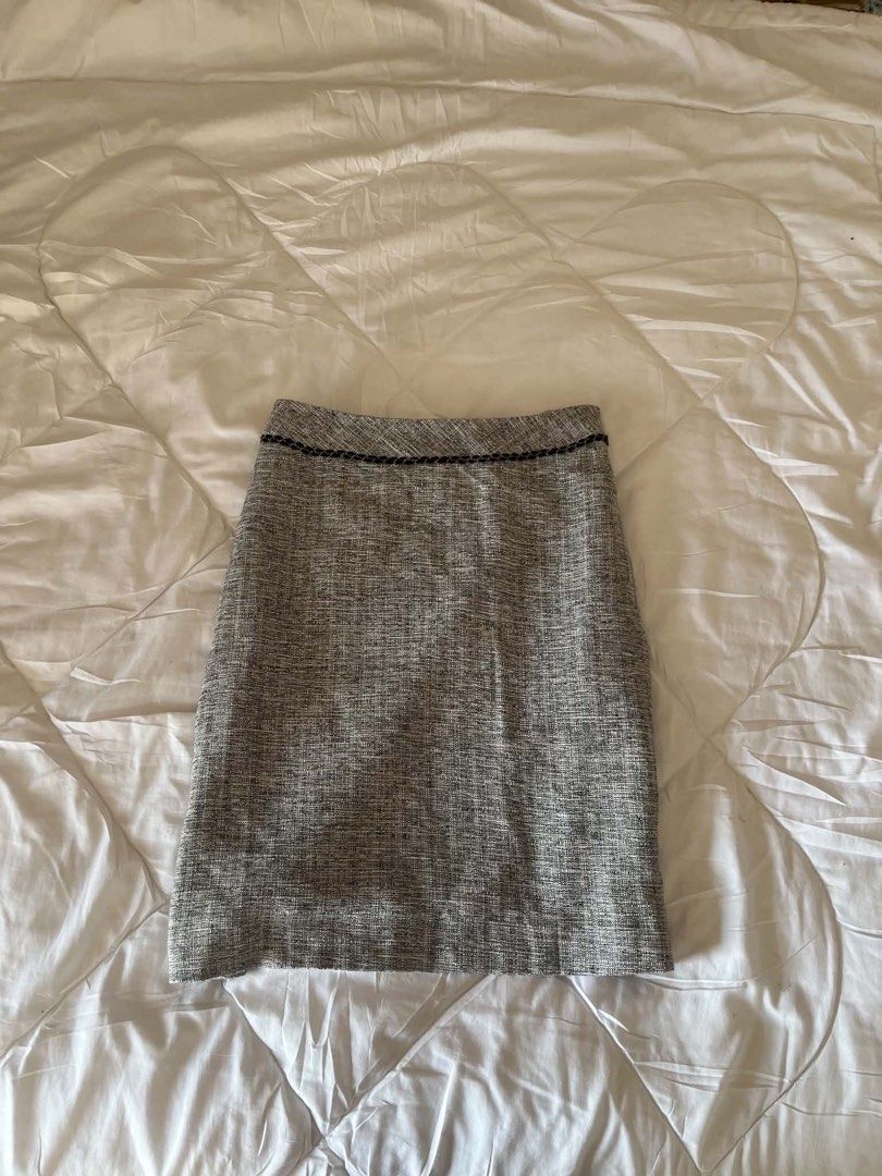 Michel Klein Tweed Gray Skirt (Category: Everything Else Others) located in Pasay City. Submitted by thevintageeditbyashley (Listing ID 1433682239, Image 2). Description: - Michel Klein tweed pencil skirt - Size 38 - Fabric: Rayon, acrylic, and polyester blend - Classic pencil skirt silhouette - Subtle textured pattern - Decorative trim on waistband - Light-colored lining -Office, Office Siren, Preppy, Old Money, Classy, Business casual, Formal, 
