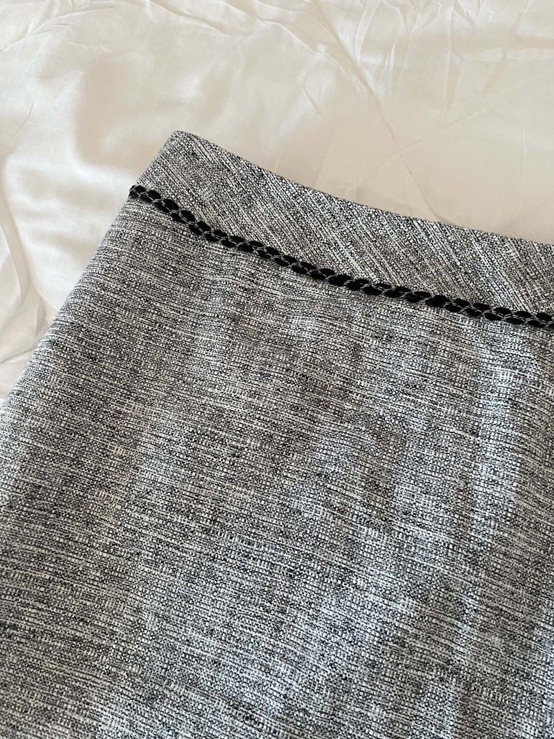 Michel Klein Tweed Gray Skirt (Category: Everything Else Others) located in Pasay City. Submitted by thevintageeditbyashley (Listing ID 1433682239, Image 3). Description: - Michel Klein tweed pencil skirt - Size 38 - Fabric: Rayon, acrylic, and polyester blend - Classic pencil skirt silhouette - Subtle textured pattern - Decorative trim on waistband - Light-colored lining -Office, Office Siren, Preppy, Old Money, Classy, Business casual, Formal, 