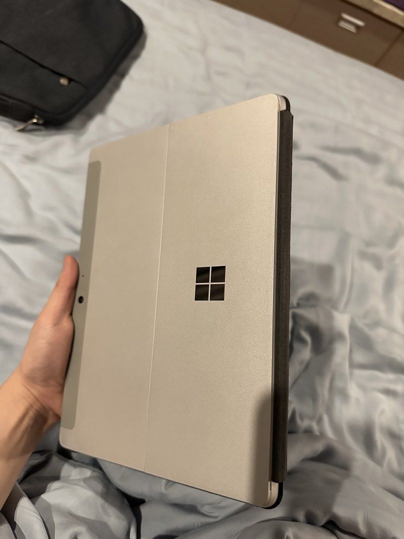 Microsoft Surface Go with Type Cover (Category: Laptops & Notebooks) located in Manila. Submitted by hashbites (Listing ID 1433677854, Image 3). Description: - Includes Type Cover - Lightly used with care - Comes with a blue carrying case - All original packaging included - No charger included - No issues Microsoft Surface Go 2018.