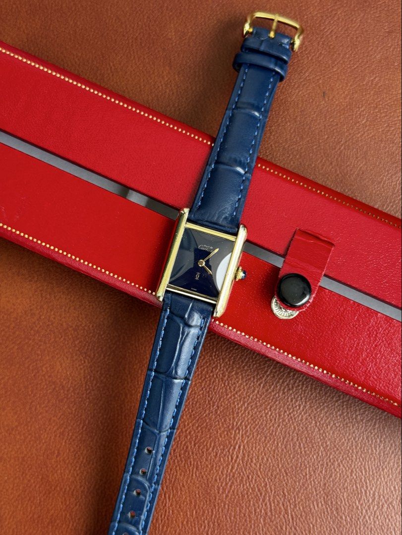 Must de Cartier Tank Blue Lacquer Dial (Category: Luxury Watches) located in Quezon City. Submitted by mjgorobat15 (Listing ID 1416919318, Image 2). Description: Must de Cartier Tank Blue Lacquer Dial •Model: Must de Cartier •Year 1980s •Movement: Manual Wind •Case: Gold plated, Vermeil 925 silver •Case size: 20mm x 28mm •Service History: January 2026 •Bracelet: New leather strap with original Cartier buckle •Inclusions: Watch only •Condition: 9/