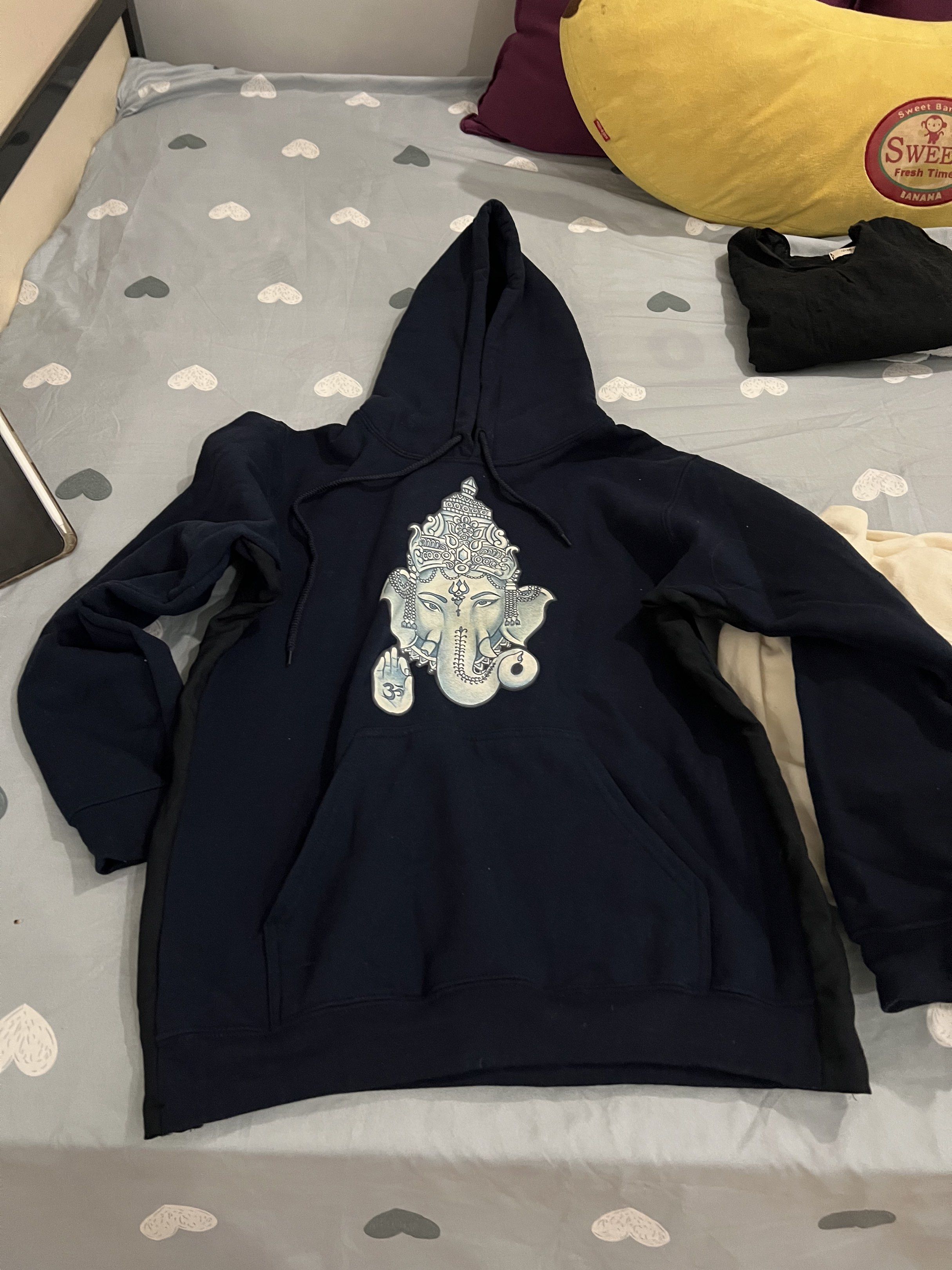 Navy Blue Ganesha Hoodie (Category: Coats, Jackets and Outerwear) located in Quezon City. Submitted by jade.young (Listing ID 1433659201, Image 1). Description: - Navy blue hoodie - Features a Ganesha graphic - Hooded with a front pocket - Black panels on sleeves - Comfortable material - Standard fit - Ideal for casual wear 21 x 24.5 size fits womens large.
