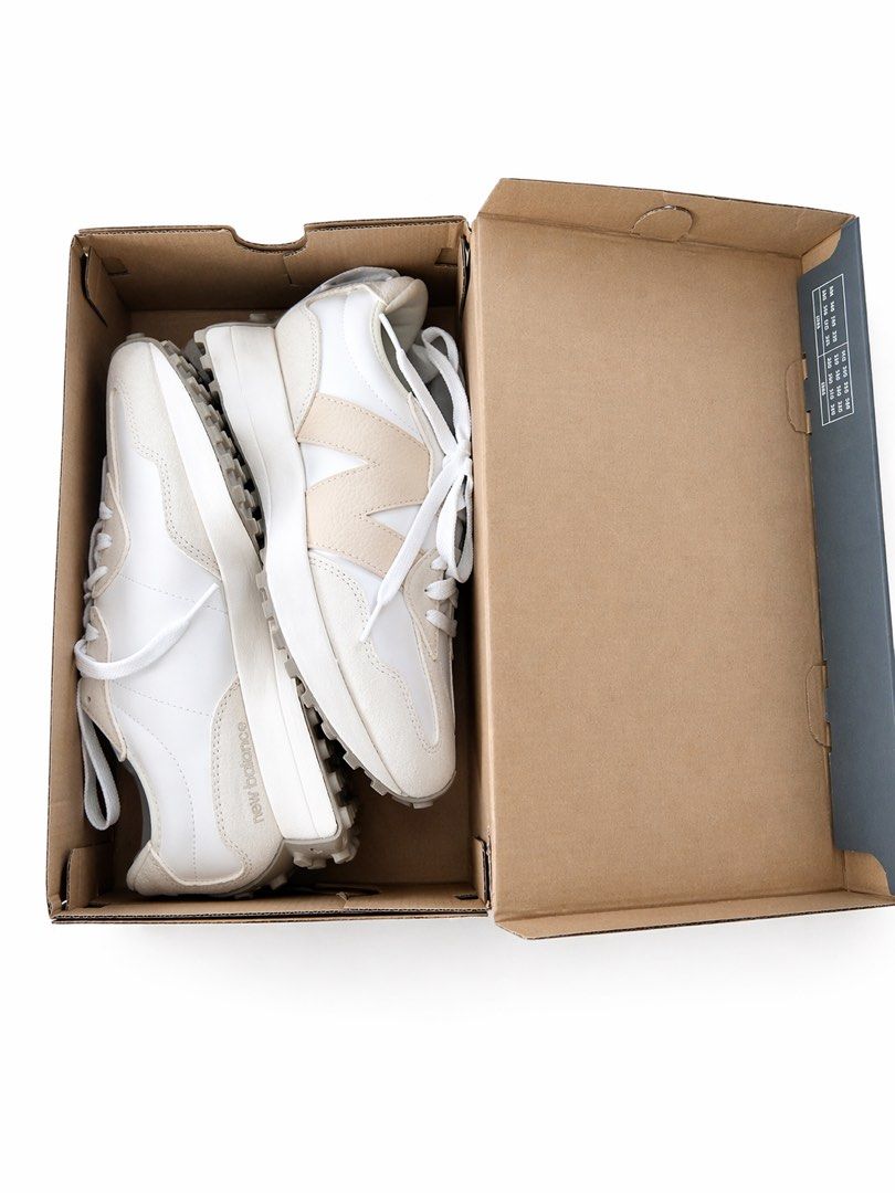 New Balance 327 Sneakers (Category: Sneakers) located in Antipolo. Submitted by cl026 (Listing ID 1433623399, Image 2). Description: - New Balance 327 sneakers - Color: White and beige - Features the iconic New Balance logo - Retro design - Includes original box - White laces.