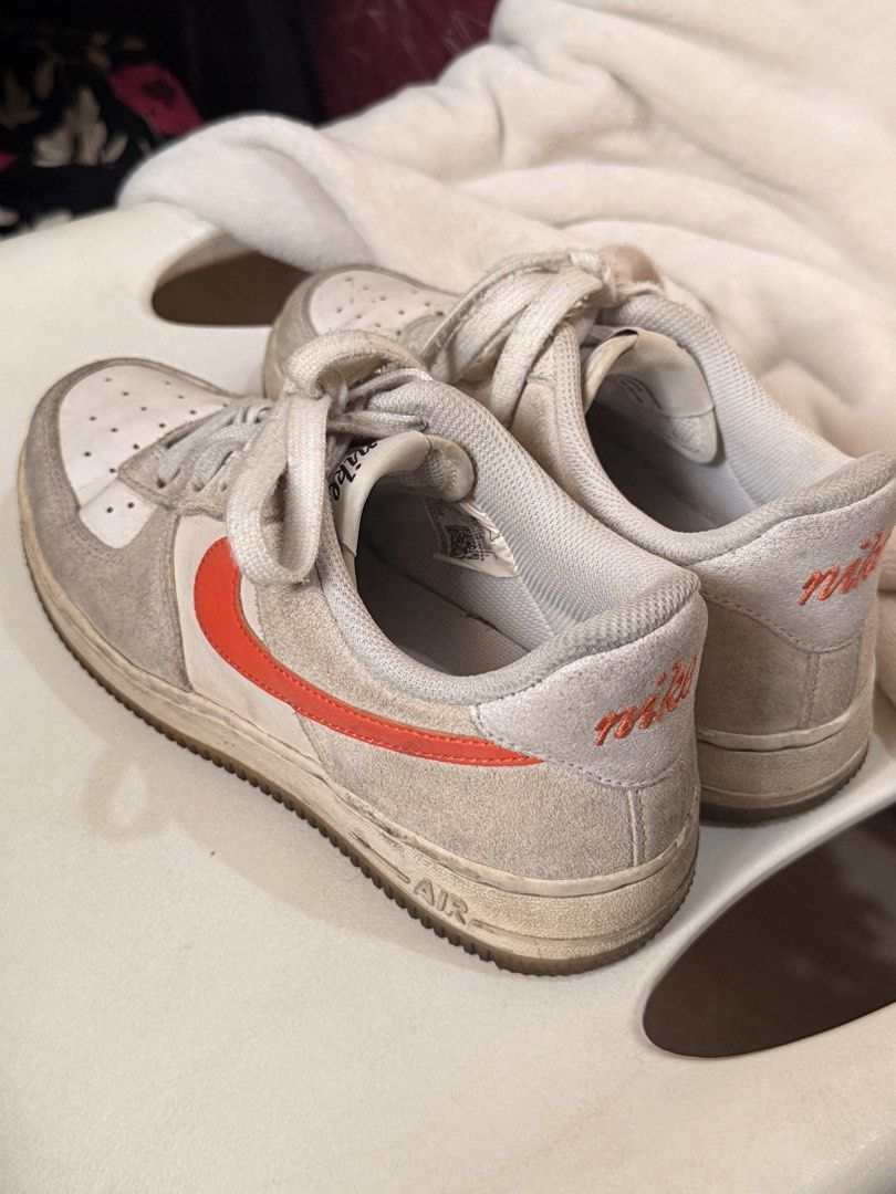 Nike Air Force 1 Low (Category: Sneakers) located in Pasig City. Submitted by beasarchive (Listing ID 1433588755, Image 2). Description: - Nike Air Force 1 Low sneakers - Color: White and orange - Suede-like material - just needs cleaning.