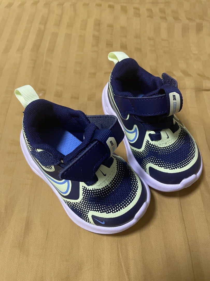 Nike Baby Shoes (Category: Babies & Kids Fashion) located in Quezon City. Submitted by declutter-jen (Listing ID 1433714436, Image 1). Description: - Nike baby shoes - Color: Navy blue and neon green - Size: US 4C (EUR 19, 10 cm) - Easy on and off with velcro - Stylish white sole - Brand new RFS: wrong size, too small for my baby when it was bought.
