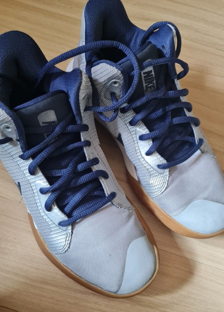 Nike Basketball Shoes - Size 6 (Category: Babies & Kids Fashion) located in Pasig City. Submitted by rakel10 (Listing ID 1433648389, Image 3). Description: - Nike basketball shoes - Color: Grey and navy blue - Low-top design - Size 6 - Model: AQ7495-008 - Features lace-up closure and rubber sole - Nike logo visible - Stored in the cabinet for some time, so some light cleaning may be needed. - Please manage your expectations, as this is a pre-love