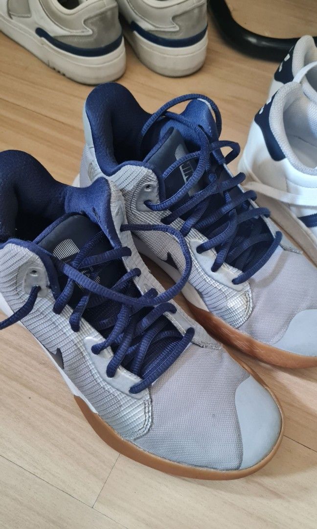 Nike Basketball Shoes - Size 6 (Category: Babies & Kids Fashion) located in Pasig City. Submitted by rakel10 (Listing ID 1433648389, Image 1). Description: - Nike basketball shoes - Color: Grey and navy blue - Low-top design - Size 6 - Model: AQ7495-008 - Features lace-up closure and rubber sole - Nike logo visible - Stored in the cabinet for some time, so some light cleaning may be needed. - Please manage your expectations, as this is a pre-love
