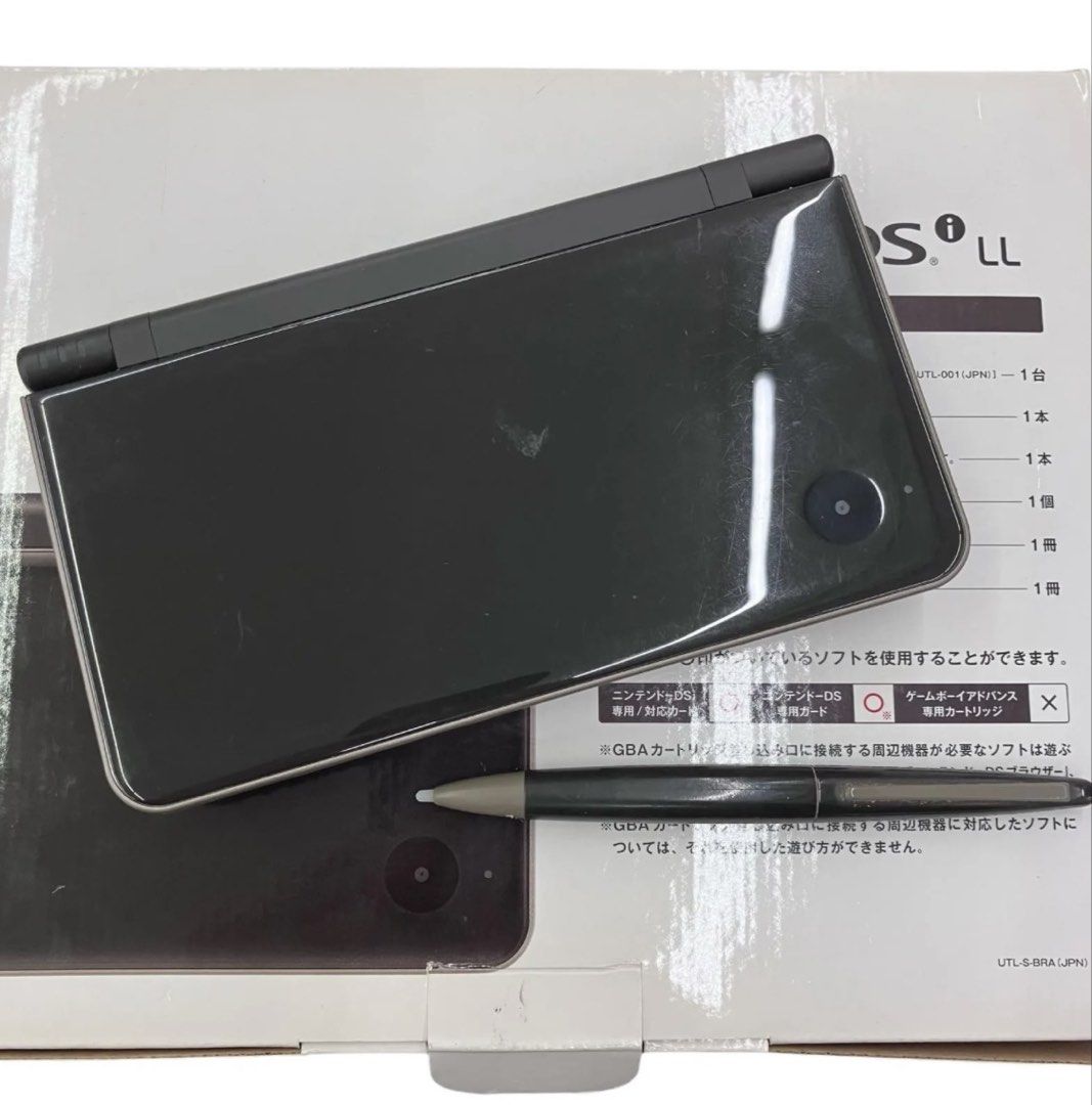 Nintendo DSi XL LL Bronze/Dark Brown (Category: Nintendo) located in Manila. Submitted by rmemz.mnl (Listing ID 1433757689, Image 3). Description: Nintendo DSi XL LL Bronze/Dark Brown - Japanese Console - Complete with Box, Manual and Original Pen - WYSIWYG - Working unit and firm buttons - Cosmetics: 8.5/10 - Free USB Charging Cable - Negotiable - Payment via BPI/Tonik/GoTyme - Shipping c/o Buyer - Can be bundled with other items .