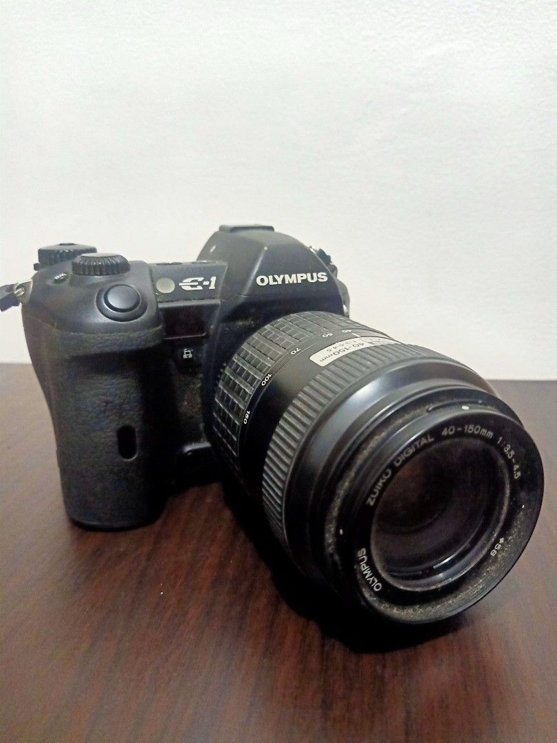 Olympus E-1 Digital Camera with Zuiko Lens (Category: Cameras) located in Las Pinas. Submitted by the_recycle_shop (Listing ID 1433728970, Image 1). Description: Not tested selling as is not working Buy at your own risk Camera with battery and lens No other accessories .
