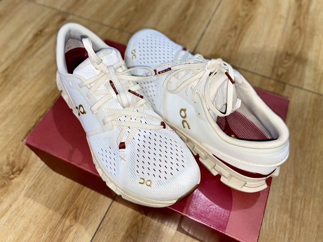 On Cloud X 4 Pearl Ivory Running Shoes (Category: Sneakers) located in Manila. Submitted by jamesdabeanstalk (Listing ID 1433710975, Image 2). Description: - On Cloud X 4 running shoes - Color: Pearl Ivory - Breathable mesh upper - CloudTec sole for cushioning - Sleek design with gold accents - Burgundy interior - Comes with original box - Perfect for running and everyday wear.