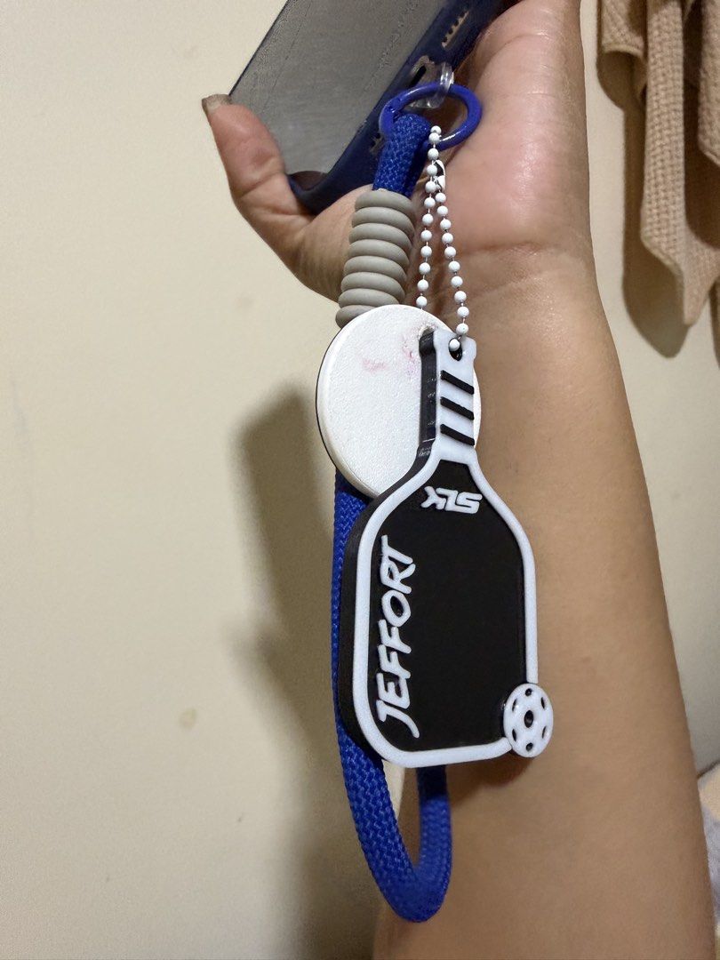 Pickle ball keychain (customized) (Category: Racket and Ball Sports) located in Manila. Submitted by nicolenyx (Listing ID 1433767702, Image 1). Description: Can customize your name, color and paddle brand :)).