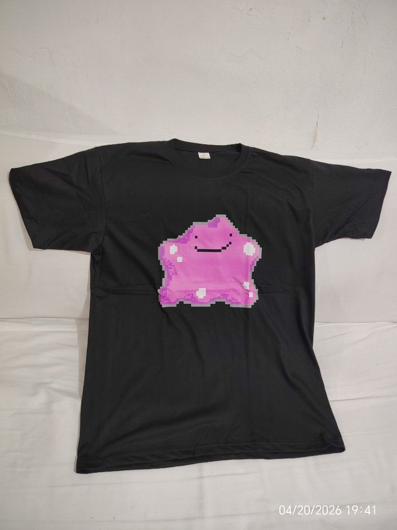 Pokemon Ditto T-shirt XL (Category: Tshirts & Polo Shirts ) located in Kalibo. Submitted by anything_random (Listing ID 1433582661, Image 1). Description: - Black Softtex T-shirt - Features a pixelated Ditto design - Size: XL - Crew neck - Made in the Philippines (RP) - Adult size chart available.
