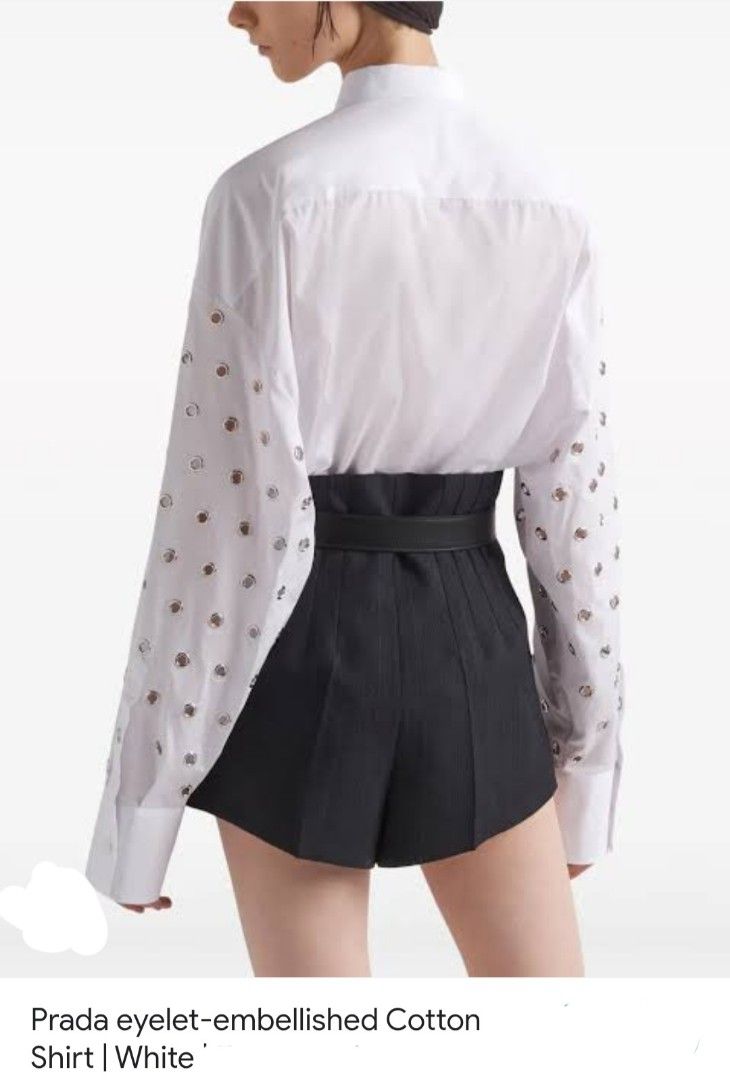 Prada Eyelet-Embellished Cotton Shirt - White (Category: Shirts) located in Manila. Submitted by msaludo (Listing ID 1433781749, Image 2). Description: Good condition Missing main label - Authentic Prada shirt - Eyelet-embellished design - Color: White - Size: 36 - Made in Italy - Fabric: 100% cotton - Features long sleeves and classic collar - Versatile for various occasions.